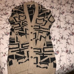 Cardigan sweater Length 42”.